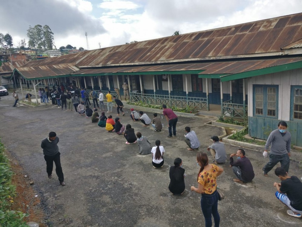 Electorate wait to cast votes adhering to COVID-19 SOPs by maintaining social distance at PWD Office, Bazaar Ward Kiphire on November 3. (Morung Photo)